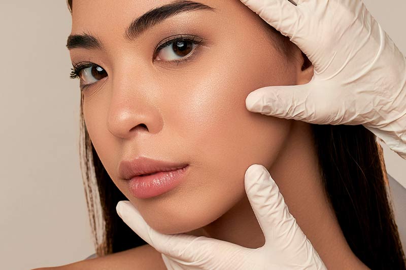 A follow-up visit to treat lip filler migration.